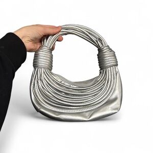 Silver metallic faux leather handbag with zipper closure #glamour #futuristic